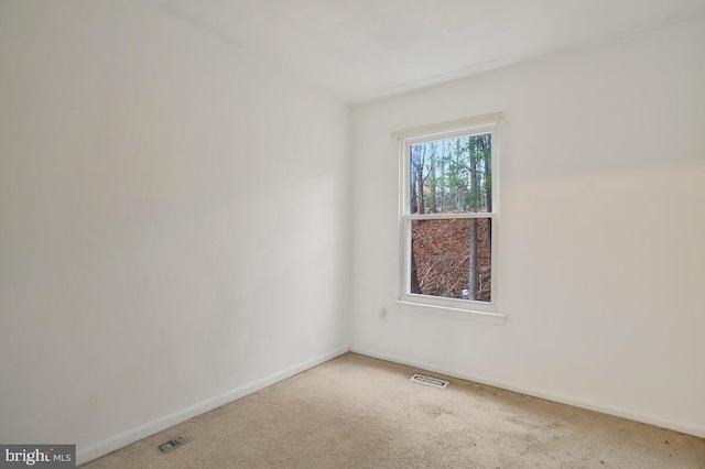 view of carpeted spare room