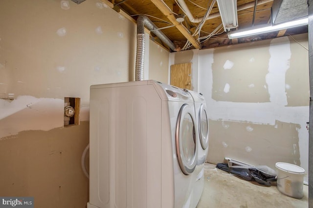 laundry area featuring washing machine and dryer