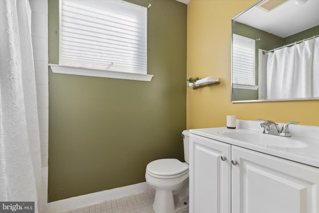 bathroom with vanity, a shower with shower curtain, tile patterned floors, and toilet