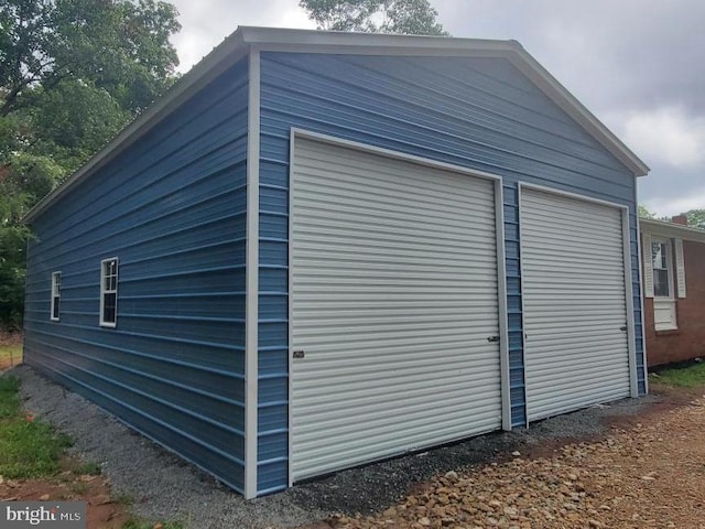 view of outbuilding featuring a garage