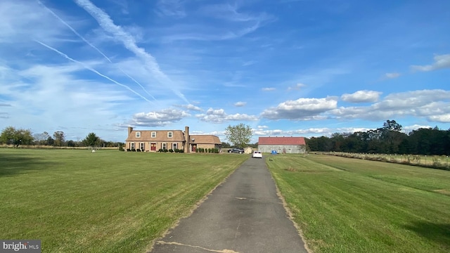 view of front of home featuring a front lawn