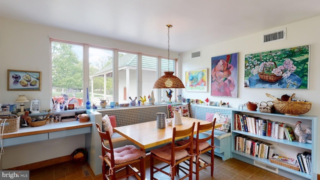 dining space with breakfast area and plenty of natural light