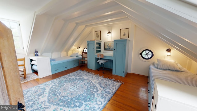 bedroom featuring light hardwood / wood-style flooring and lofted ceiling