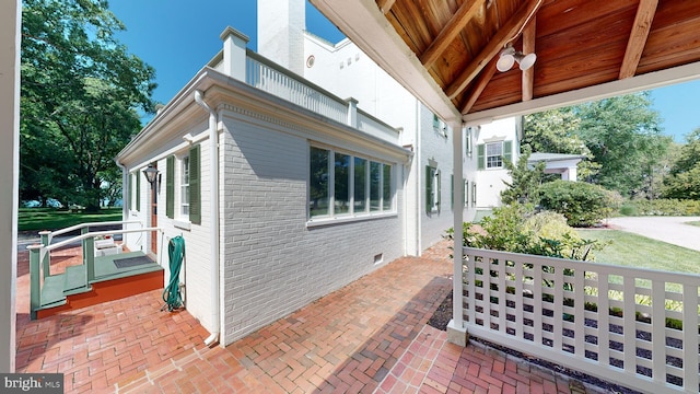 view of property exterior featuring a porch