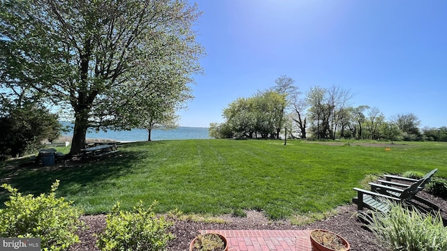 view of yard with a water view