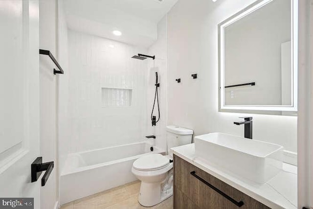 full bathroom featuring vanity, shower / bathtub combination, and toilet