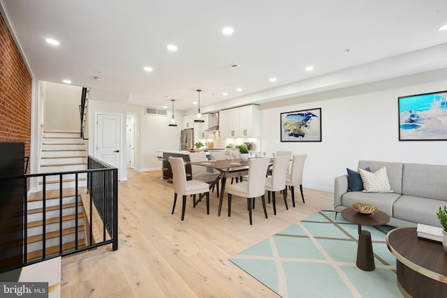 dining area featuring light hardwood / wood-style flooring