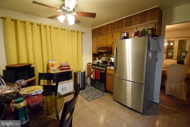 kitchen with ceiling fan and stainless steel appliances