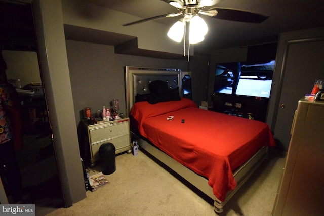 carpeted bedroom with ceiling fan