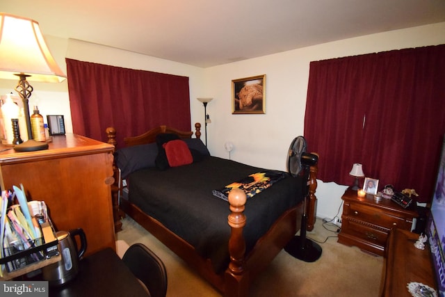 bedroom with light colored carpet