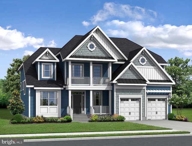 view of front of house with a front lawn and a garage