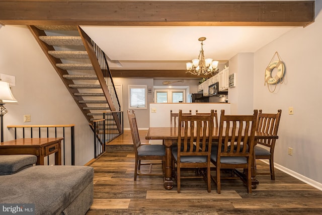 dining room featuring a chandelier, dark hardwood / wood-style floors, and beamed ceiling