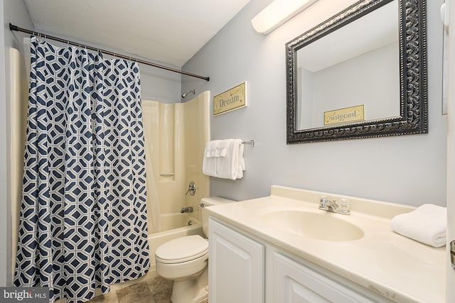 full bathroom featuring vanity, shower / tub combo, and toilet