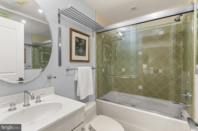 full bathroom with vanity, toilet, and combined bath / shower with glass door