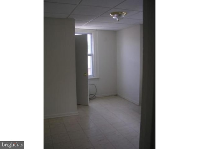 empty room with a drop ceiling