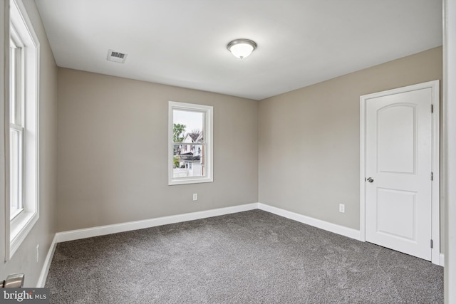 view of carpeted spare room