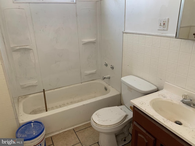 full bathroom with vanity,  shower combination, toilet, tile walls, and tasteful backsplash