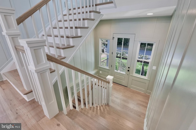 stairway with wood-type flooring