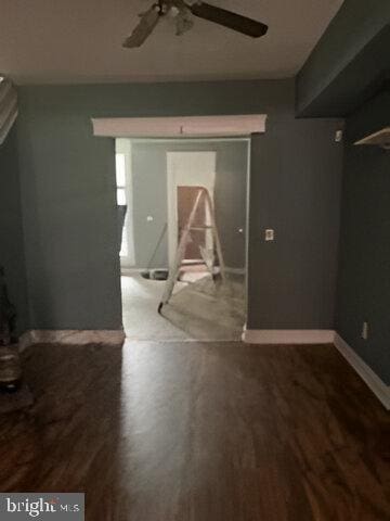 interior space featuring hardwood / wood-style flooring and ceiling fan