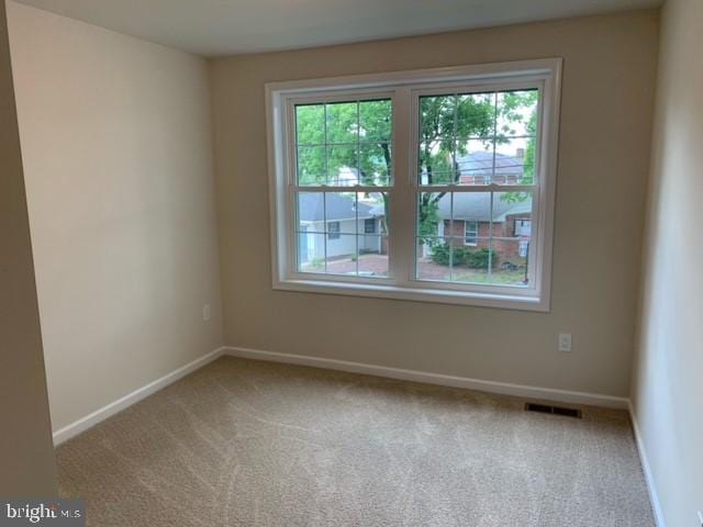 empty room with carpet floors