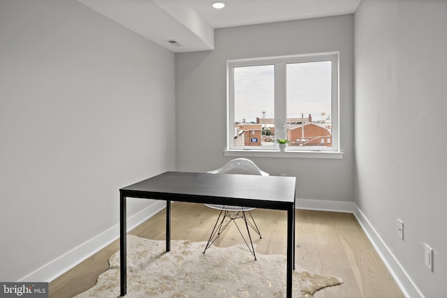 office area with light wood-type flooring