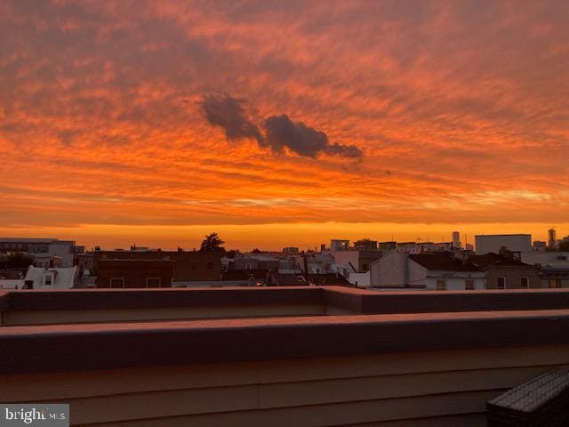 view of balcony at dusk