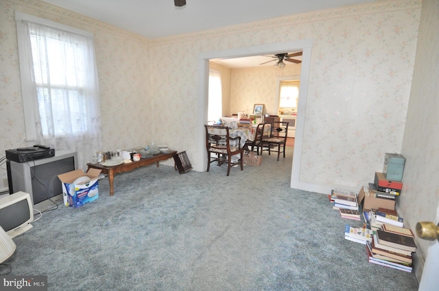 miscellaneous room with carpet flooring and ceiling fan