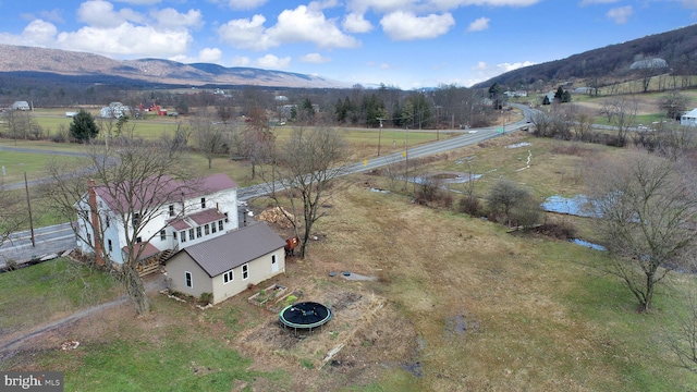 bird's eye view with a mountain view and a rural view