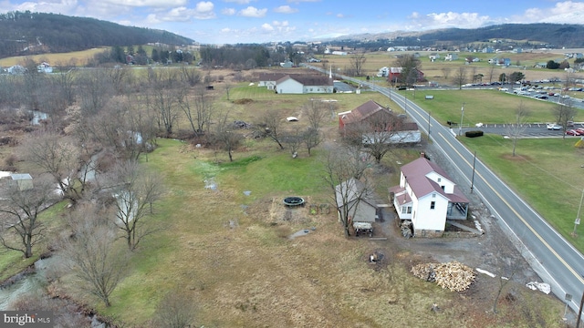 aerial view featuring a mountain view and a rural view