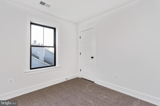 empty room with carpet floors