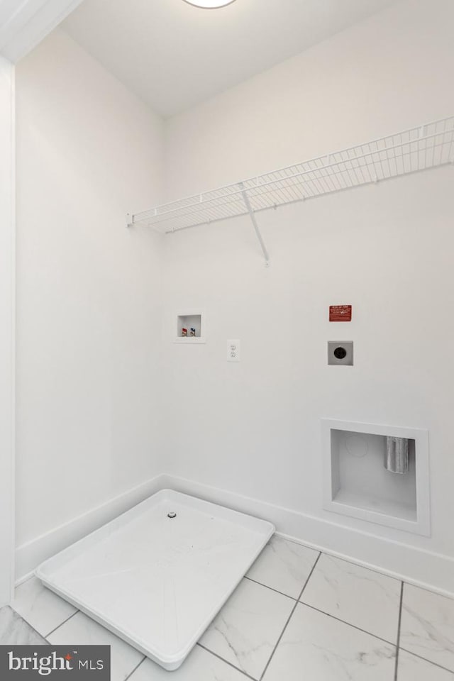 laundry area with hookup for an electric dryer and washer hookup