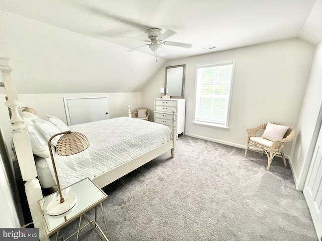 bedroom with carpet, ceiling fan, and vaulted ceiling