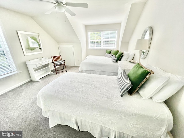 bedroom featuring carpet floors, ceiling fan, and lofted ceiling