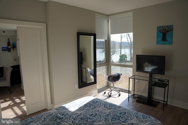 bedroom featuring hardwood / wood-style flooring