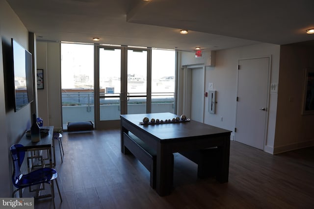 kitchen with dark hardwood / wood-style flooring and elevator