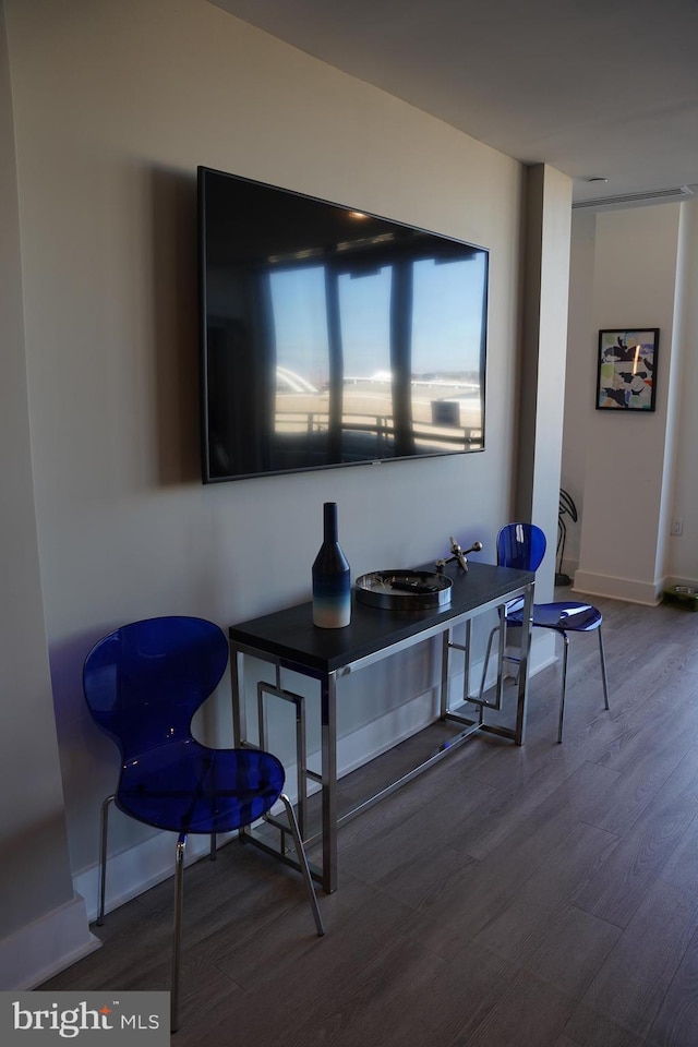 dining area featuring hardwood / wood-style floors