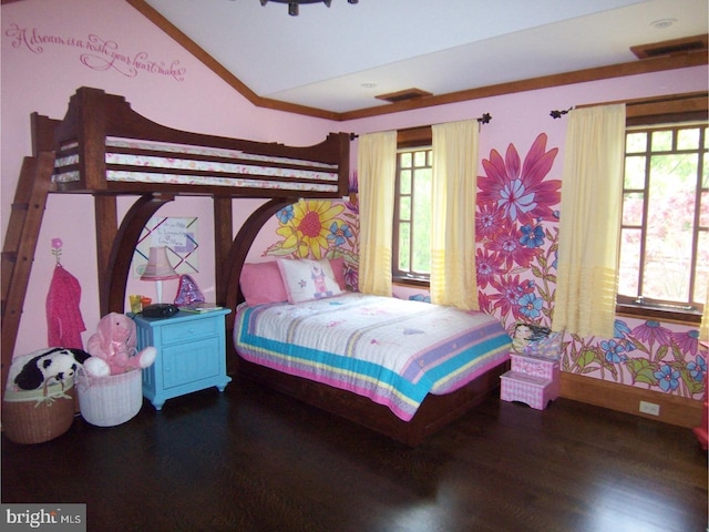 bedroom with dark wood-type flooring and multiple windows