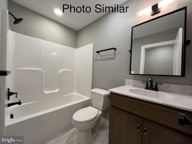 full bathroom featuring vanity, toilet, and washtub / shower combination