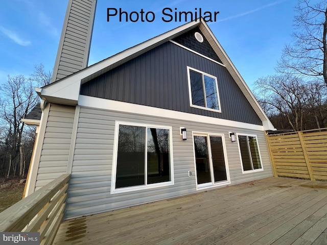 rear view of house with a deck