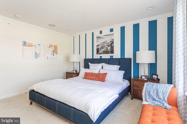 carpeted bedroom featuring crown molding