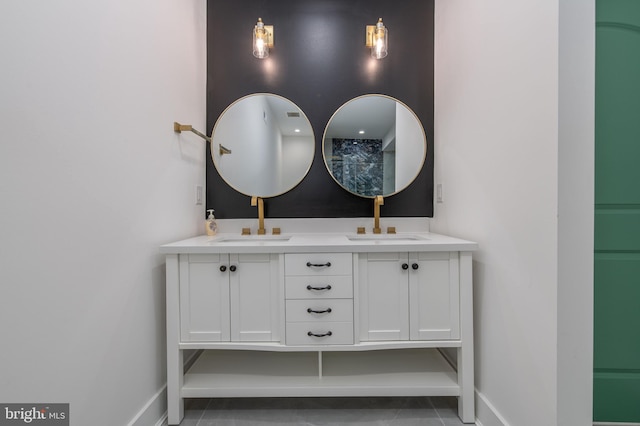 bathroom featuring tile patterned floors and vanity