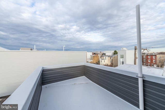 view of patio with a balcony