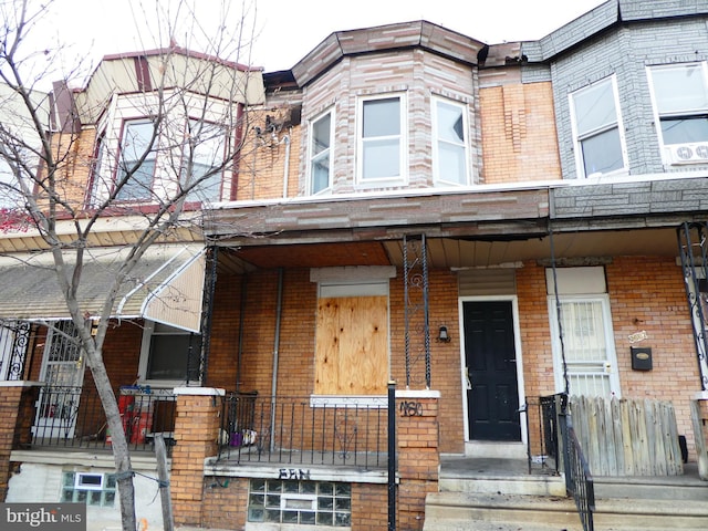 multi unit property featuring covered porch