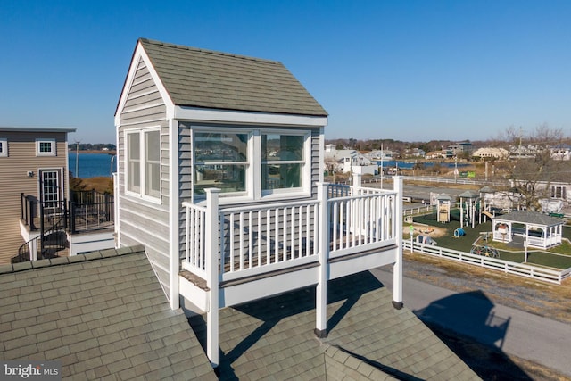 wooden deck with a water view