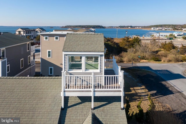 drone / aerial view featuring a water view