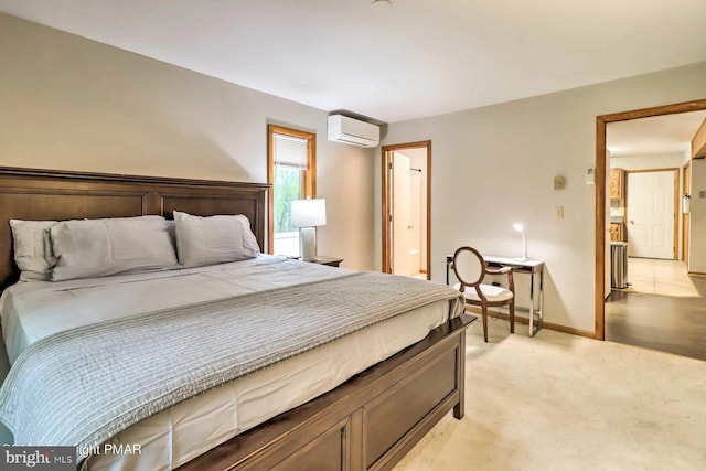 bedroom featuring light carpet and a wall mounted AC