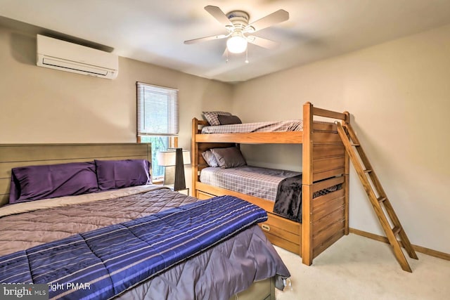 carpeted bedroom featuring a wall unit AC and ceiling fan