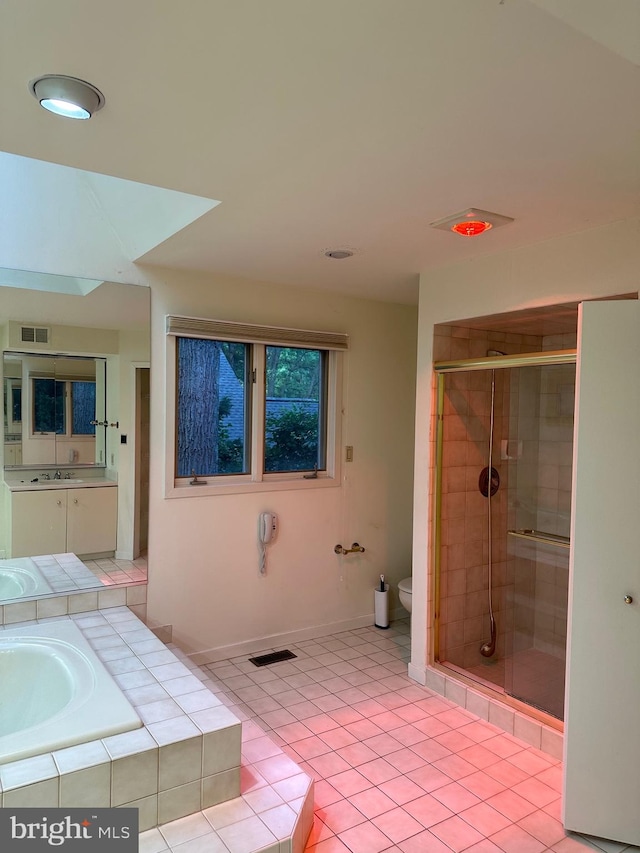 full bathroom with vanity, separate shower and tub, tile patterned floors, and toilet