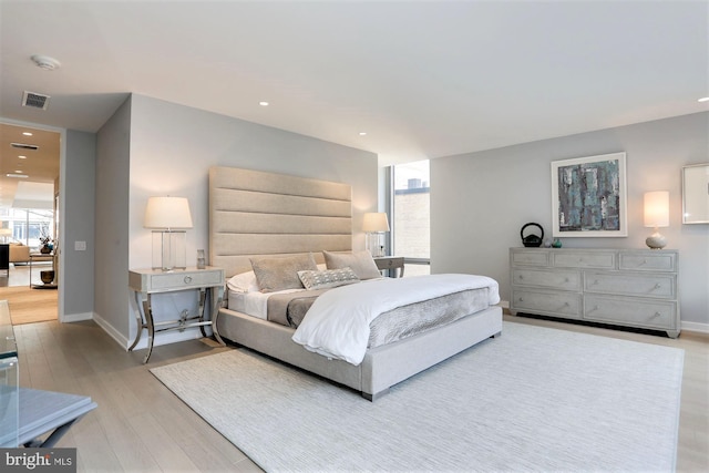 bedroom featuring light hardwood / wood-style flooring