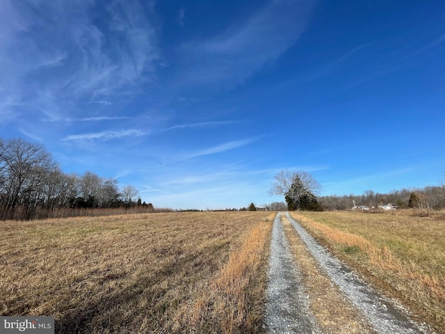 view of road featuring a rural view